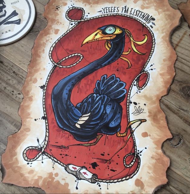 Blue bird in a red oval cartouche, painted on rough-edged paper