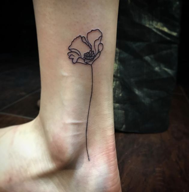 Flower tattoo by Deadpigeon (black & grey)